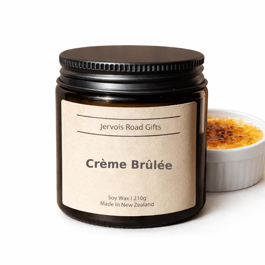 Soy candle in amber jar with kraft Medium label – Creme Brulé Small – by Jervois Road Gifts